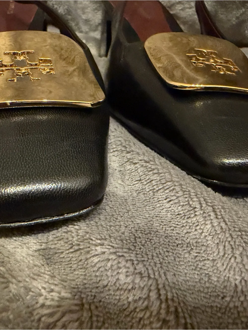 Tory Burch Black Leather Slingback Mules with Gold Plaques